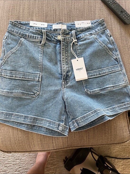 Vervet Pants - Denim Short with cargo type pocket and stretch.